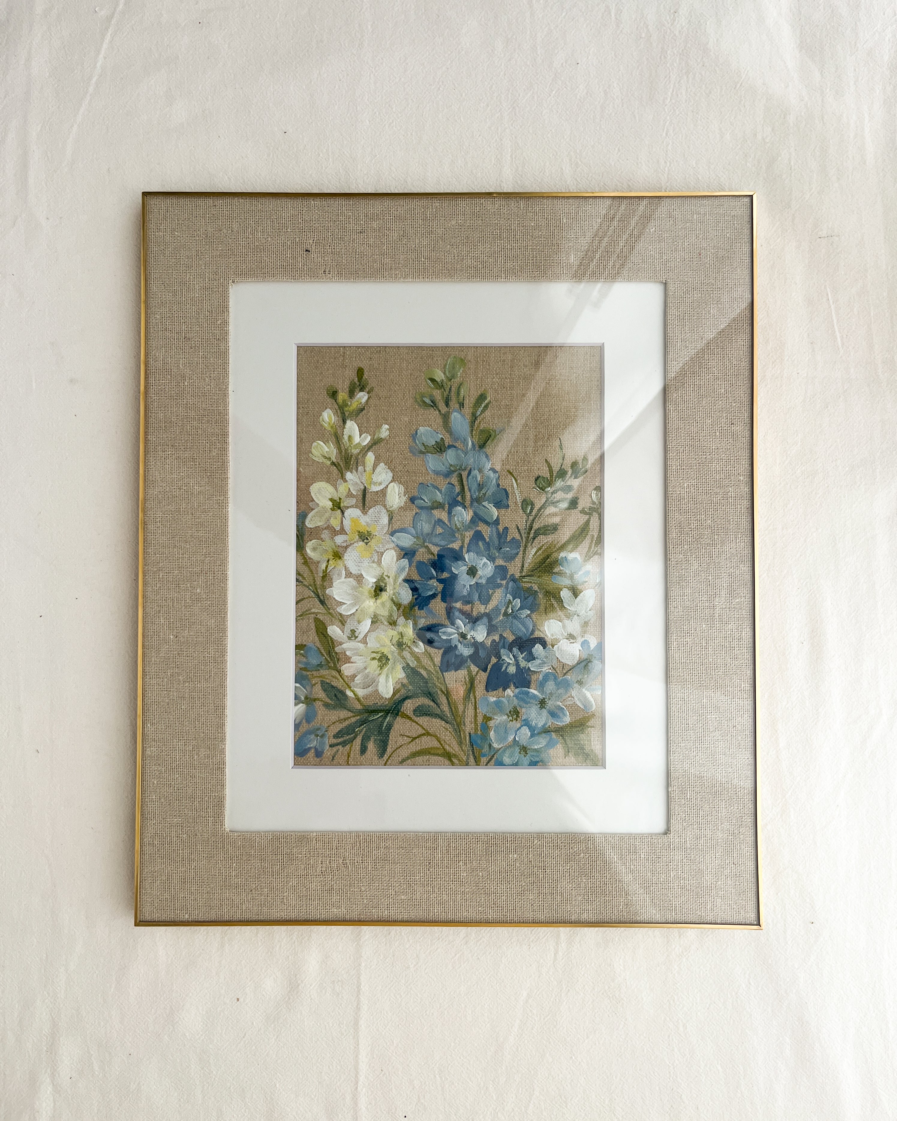 Ascending Beauty by Trisha Patel, framed original watercolor painting of blue and white delphinium flowers symbolizing openness, joy, and meaningful connections, botanical wall art