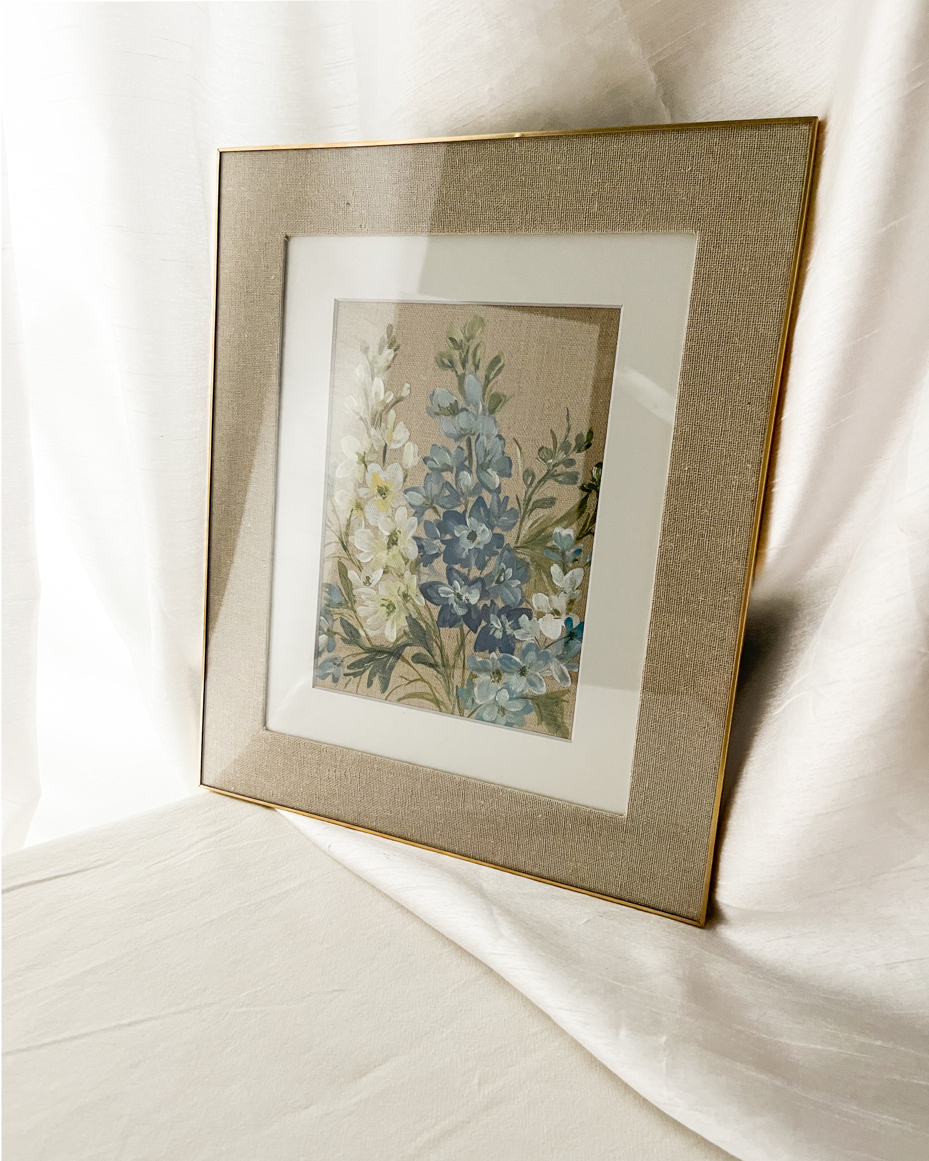 Ascending Beauty blue and white delphinium watercolor art by Trisha Patel displayed in elegant frame, modern botanical wall décor.