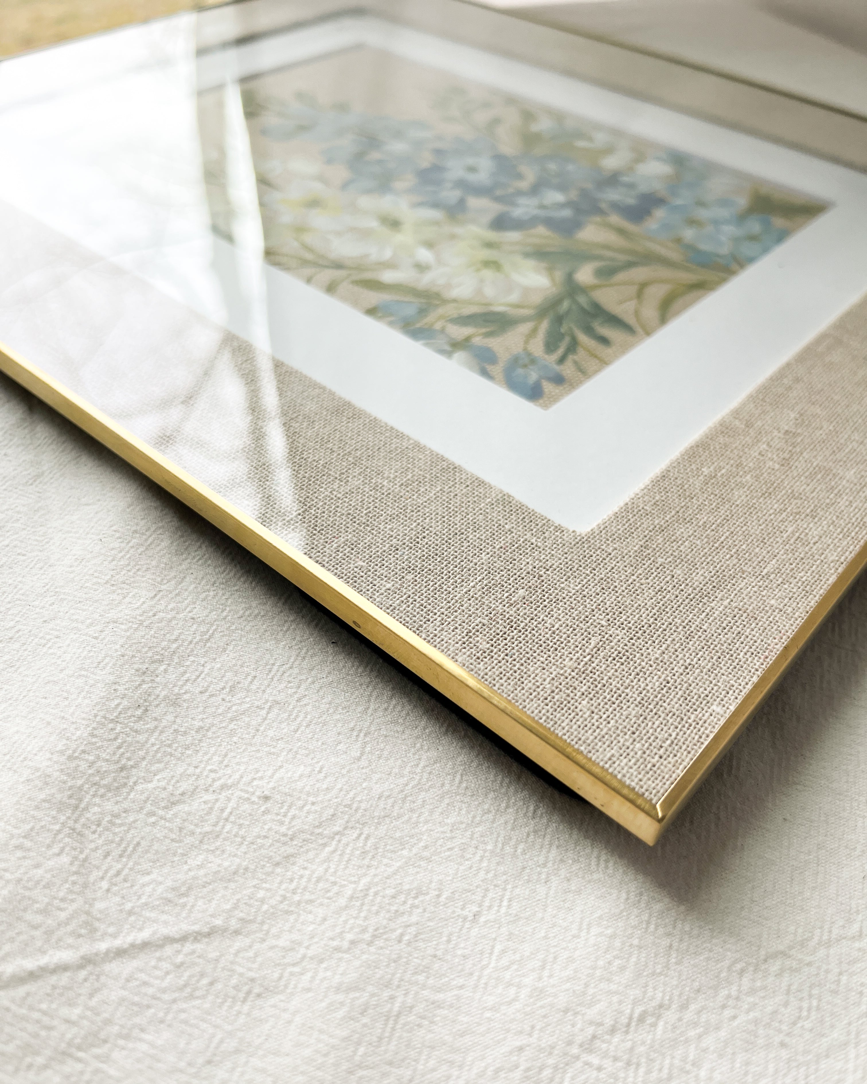 Elegant frame close-up with Ascending Beauty blue and white delphinium watercolor art by Trisha Patel. Modern botanical wall décor.