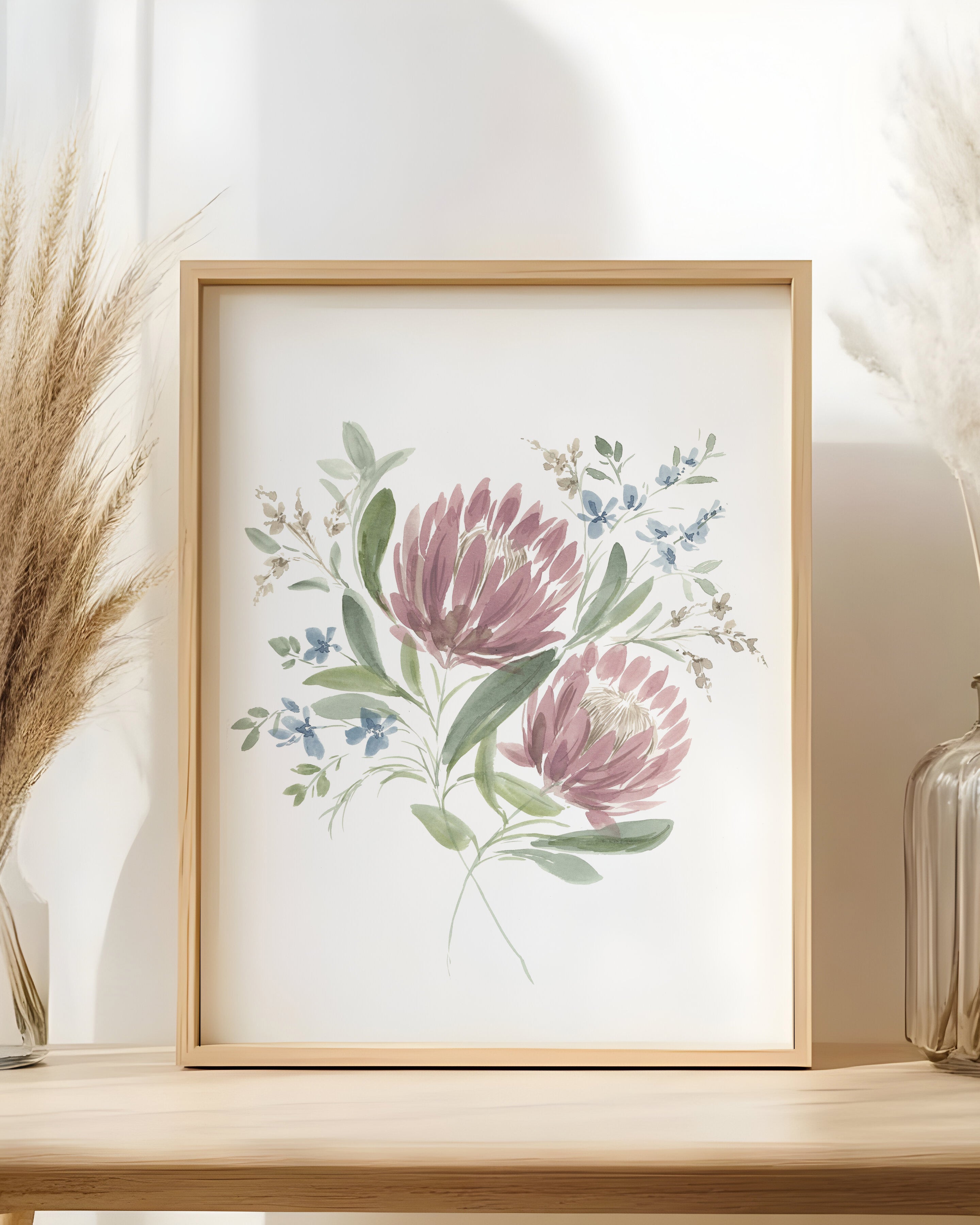 Serene watercolor with pink and blue flowers reflecting subtle light symbolizing inner strength in wood frame