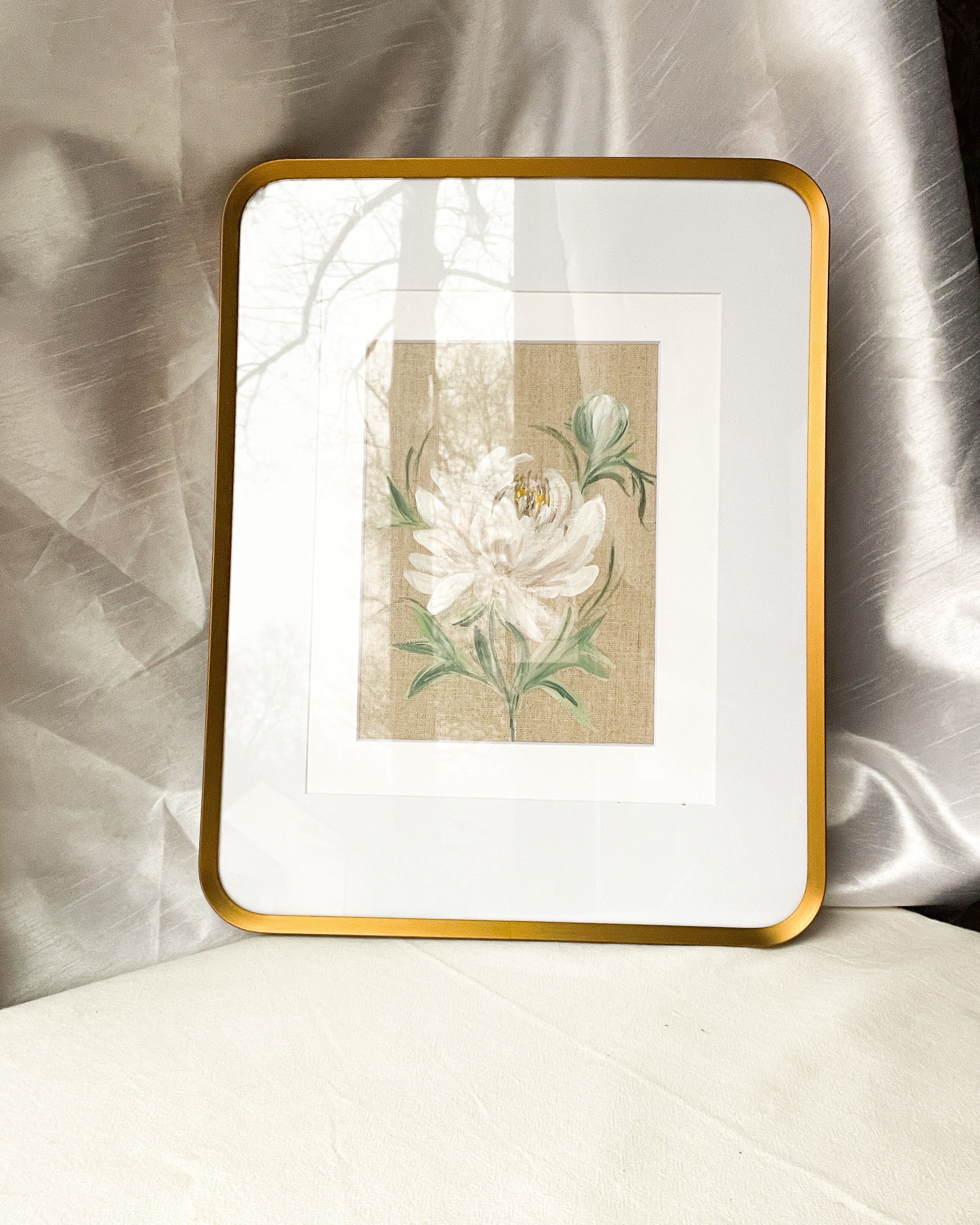 Blossoming Grace peony watercolor by Trisha Patel displayed in elegant frame, botanical wall art symbolizing emotional healing for modern home décor.