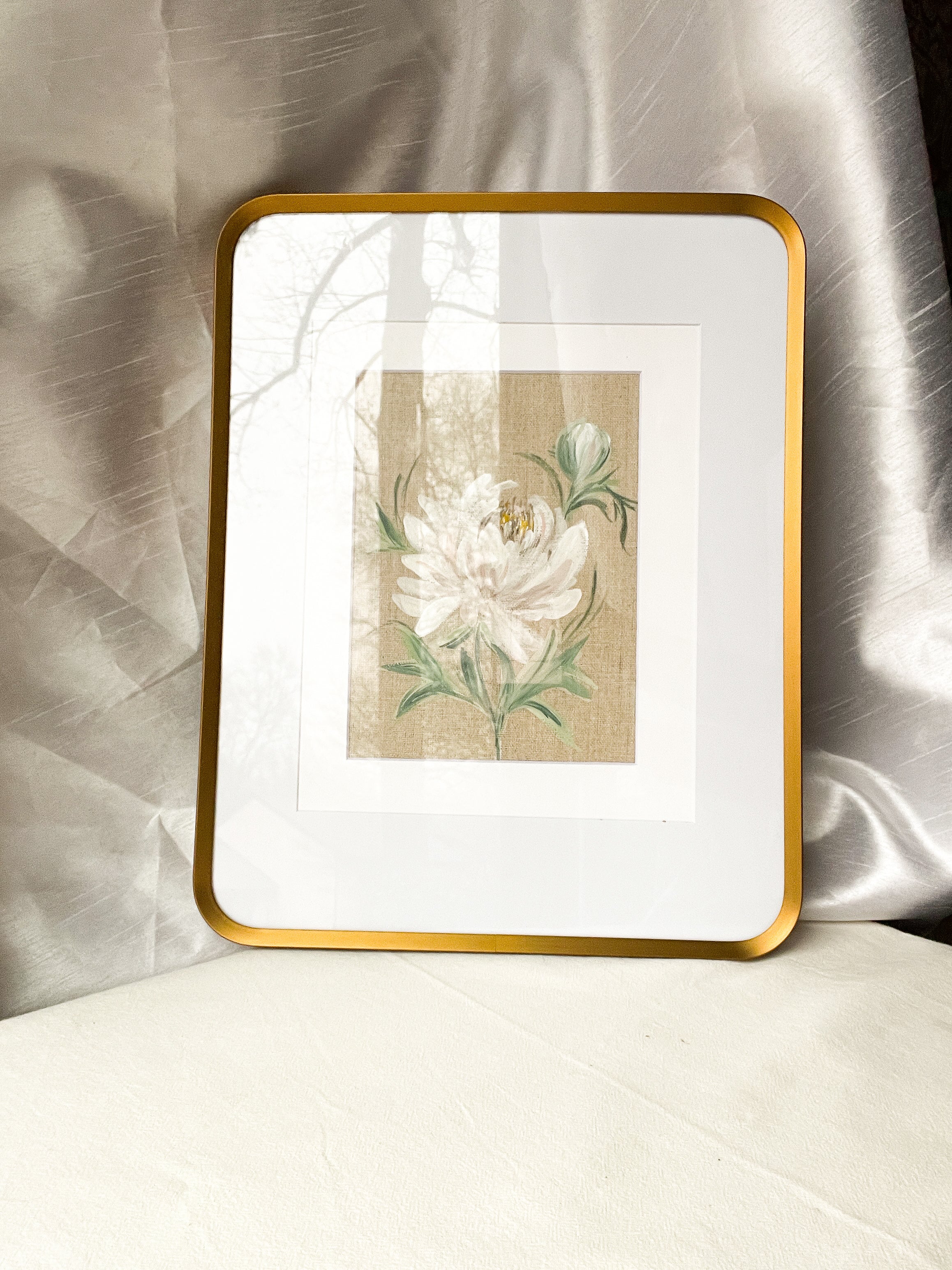 Blossoming Grace peony watercolor by Trisha Patel displayed in elegant frame, botanical wall art symbolizing emotional healing for modern home décor.