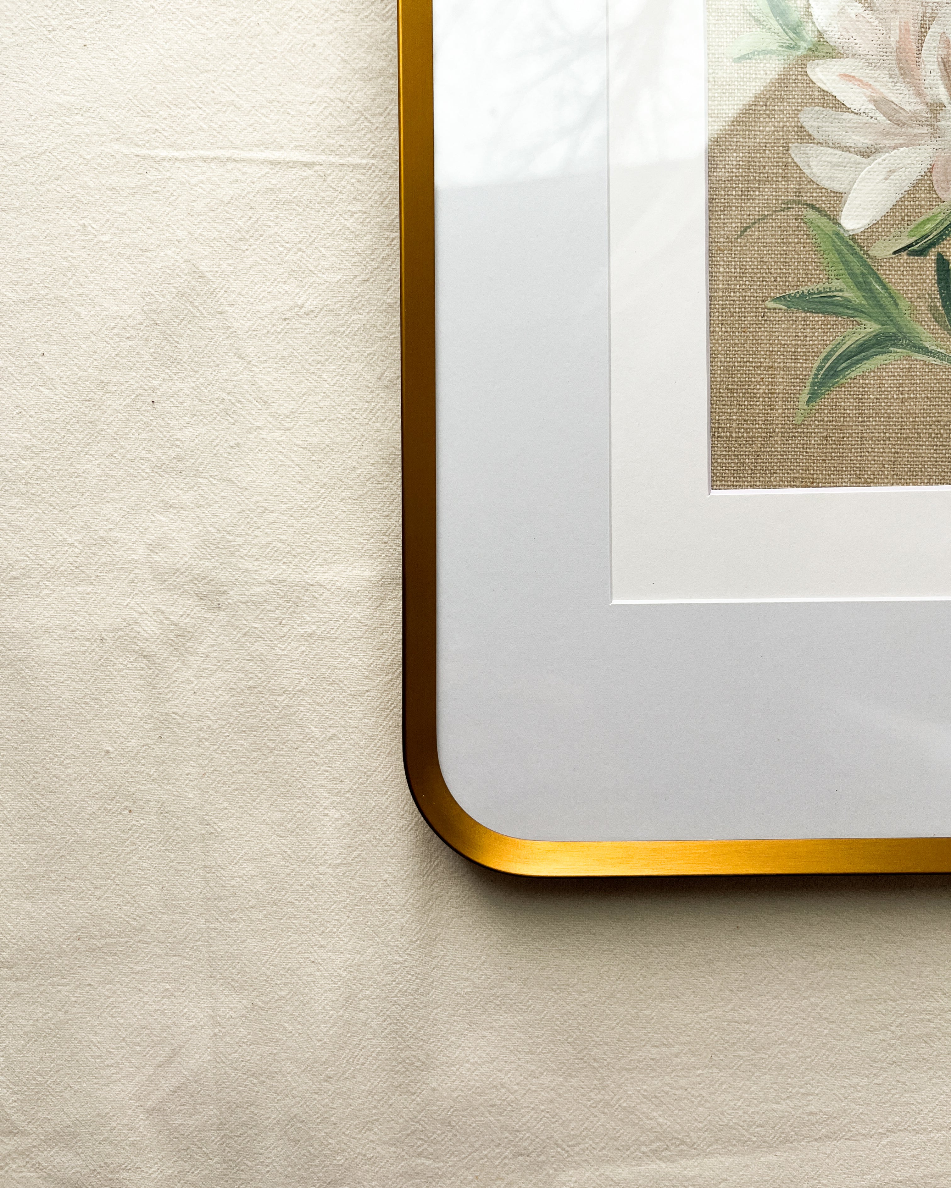Close-up of beautiful gold metal frame on Blossoming Grace peony watercolor painting by Trisha Patel, botanical wall art