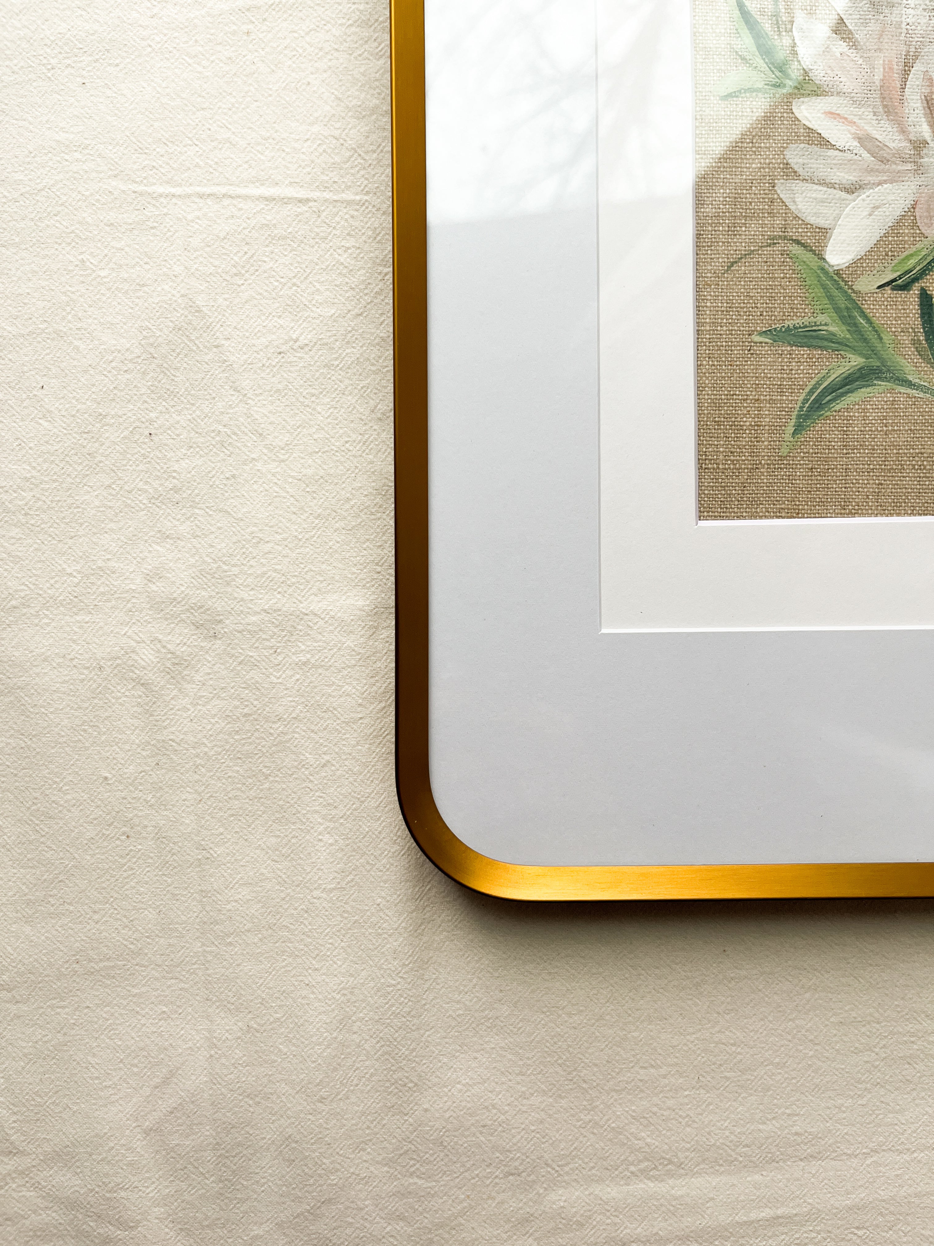 Close-up of beautiful gold metal frame on Blossoming Grace peony watercolor painting by Trisha Patel, botanical wall art
