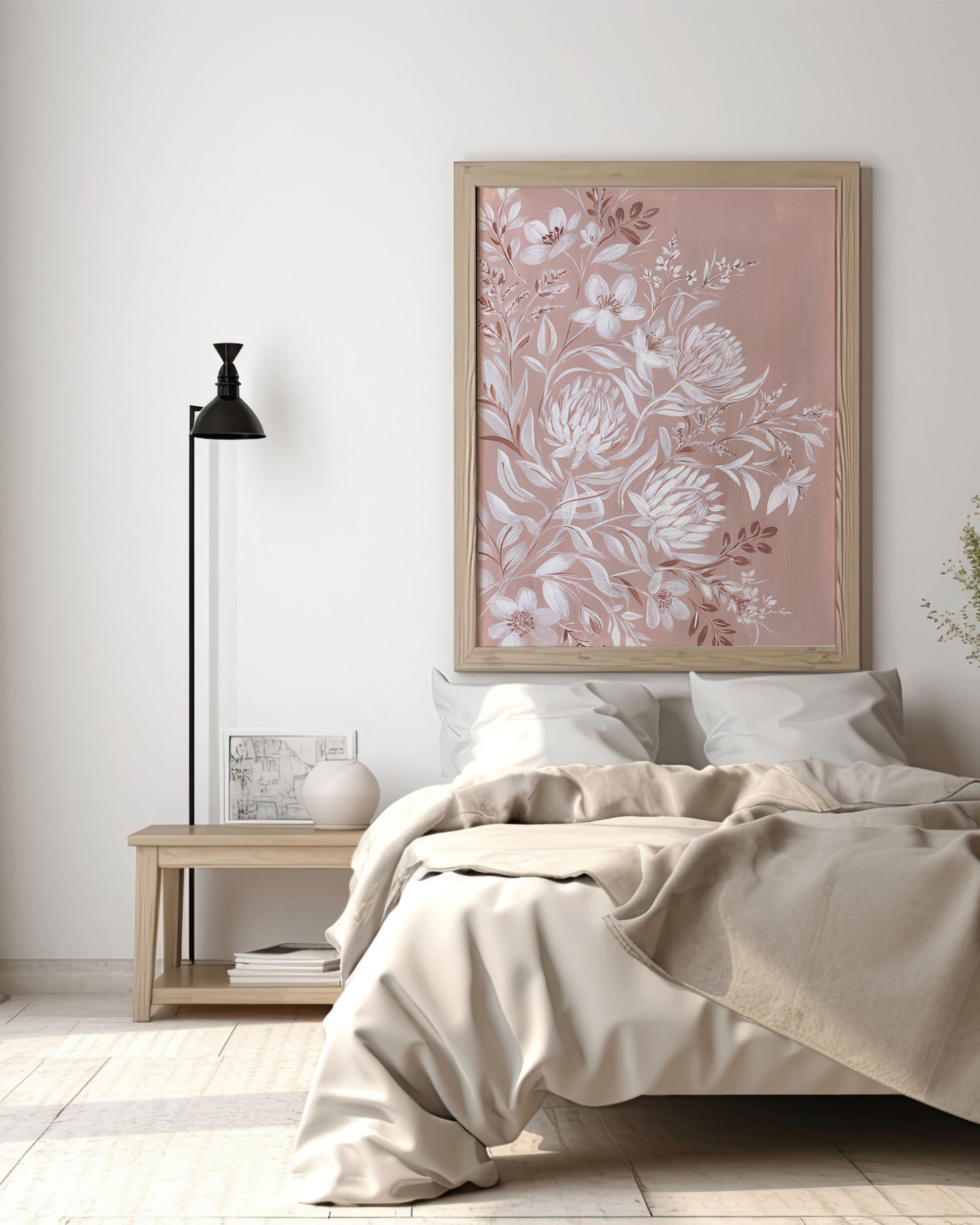 print in elegant frame displayed in serene bedroom setting with natural decor