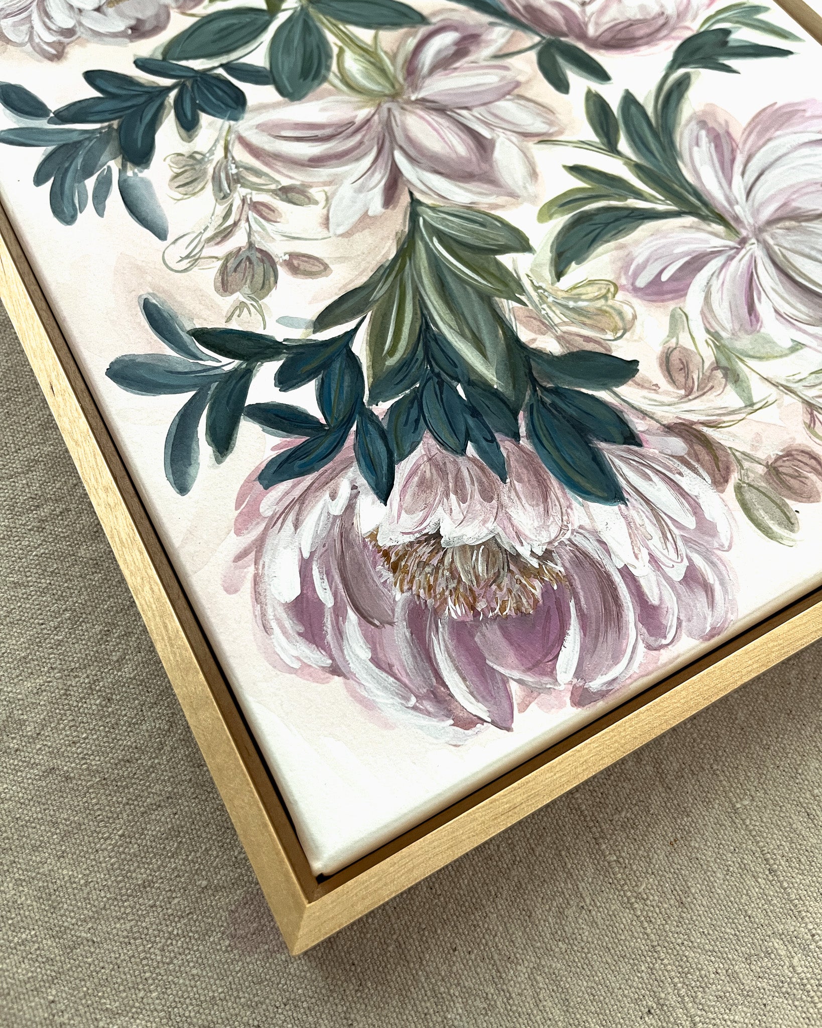 Close-up of simple maple floater frame on In Her Stillness rose and peony watercolor painting by Trisha Patel, minimalist modern botanical art