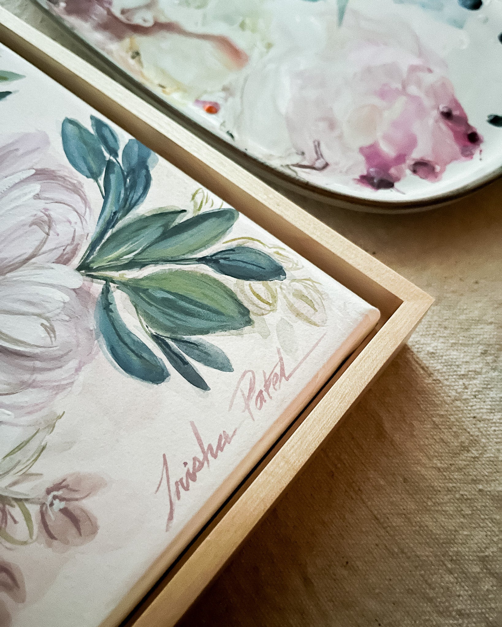 Close-up of simple maple floater frame on In Her Stillness rose and peony watercolor painting by Trisha Patel, minimalist modern botanical art