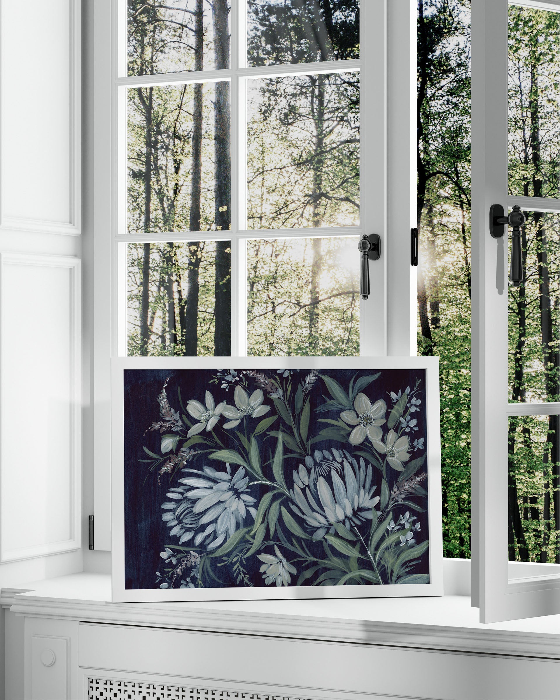 Close-up of Shadows of Resilience print in white frame showing detailed silhouetted trees against atmospheric sky