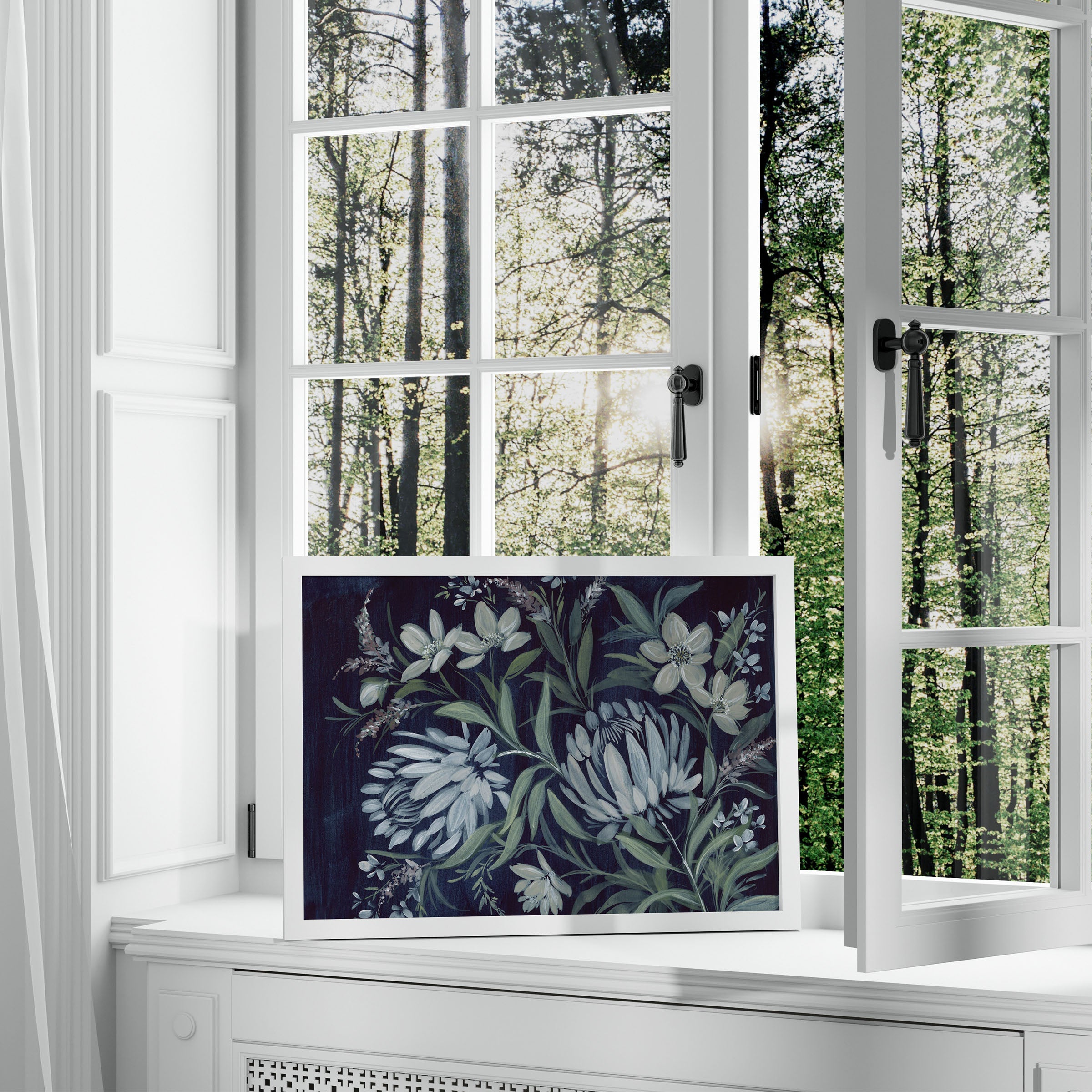 Close-up of Shadows of Resilience print in white frame showing detailed silhouetted trees against atmospheric sky