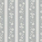 Close-up of  Kamelia wallpaper in Argentum by Trisha Patel with soft stripes and hand-drawn camellia flowers, high-quality floral wallcovering.