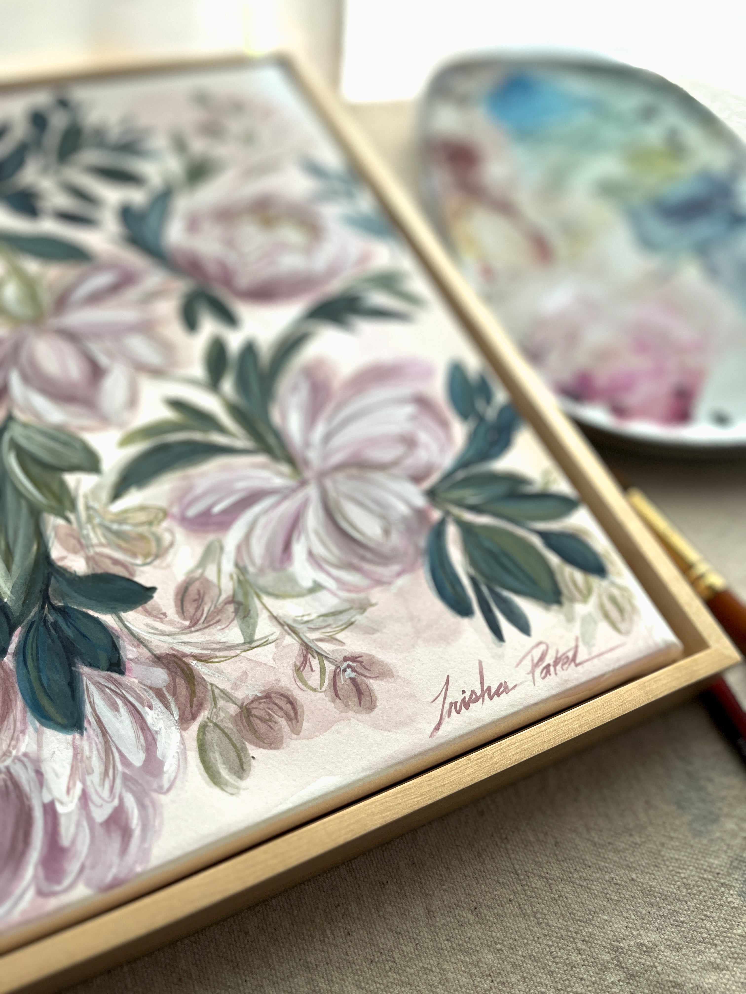 Close-up of simple maple floater frame on In Her Stillness rose and peony watercolor painting by Trisha Patel, minimalist modern botanical art