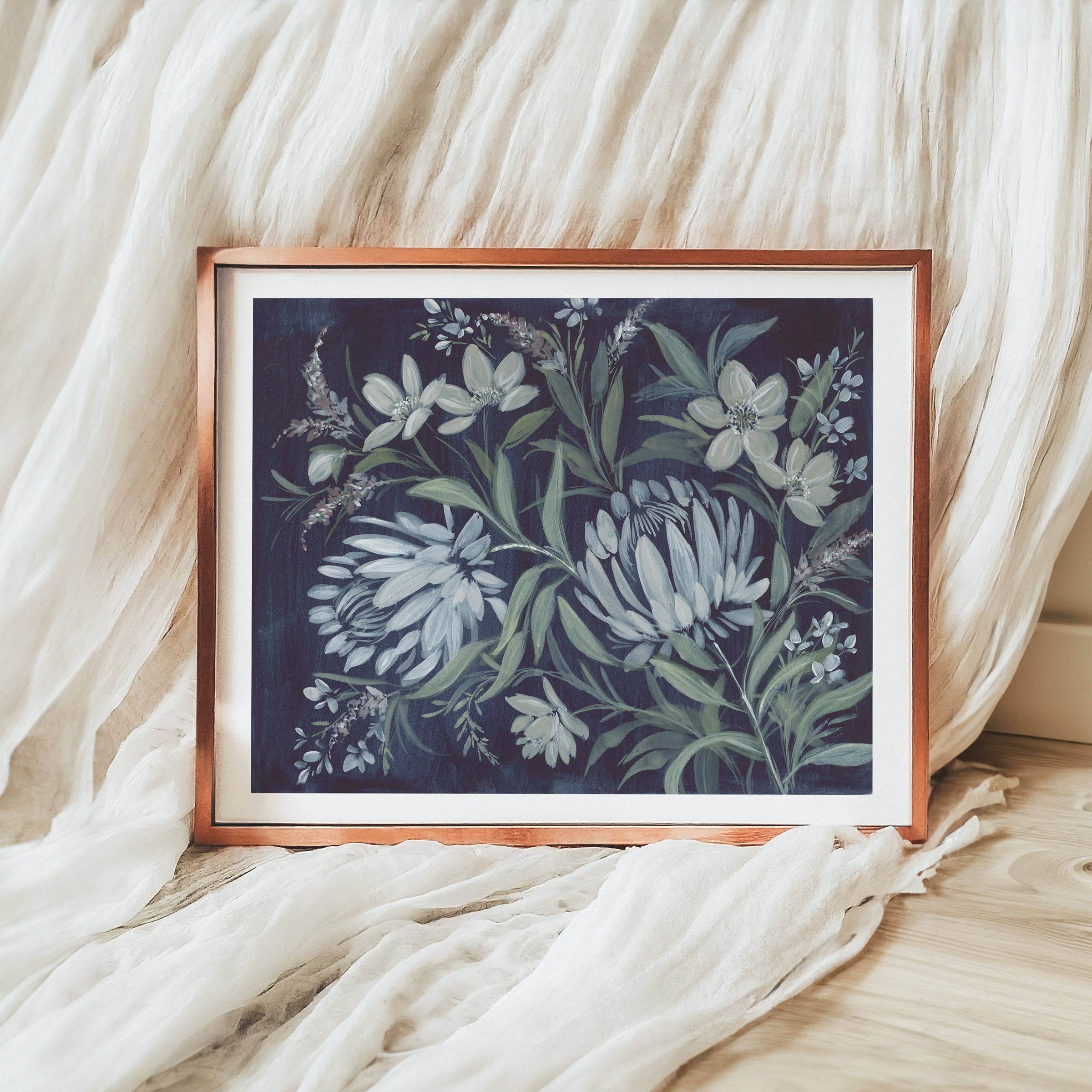 Close-up of Shadows of Resilience print in copper frame showing detailed silhouetted trees against atmospheric sky