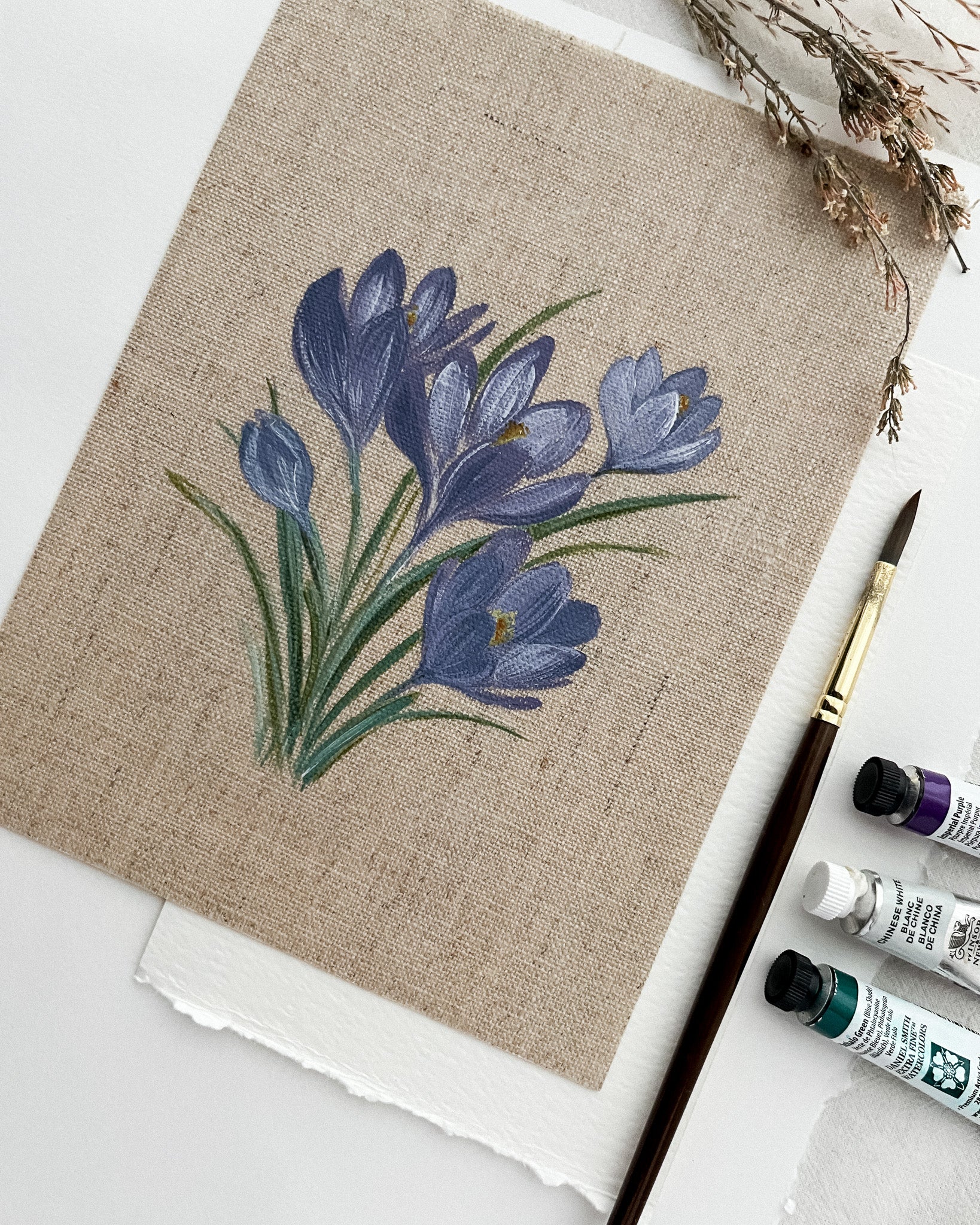 Close-up of Springs Promise crocus watercolor painting by artist Trisha Patel, highlighting delicate petals and botanical brushwork representing bravery and transformation.