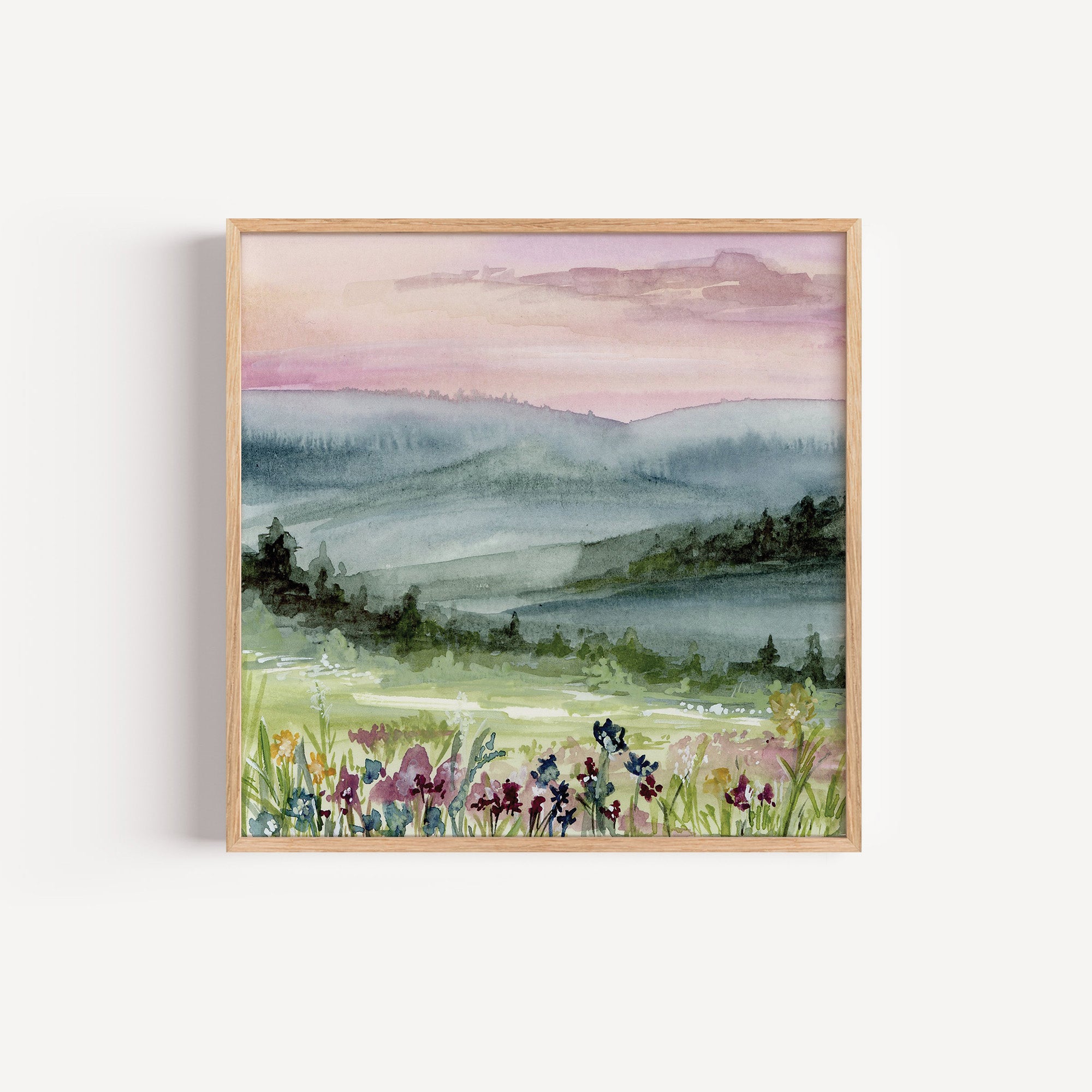 Framed print of Serene watercolor landscape with soft pink and purple dawn sky reflecting on calm water with silhouetted trees